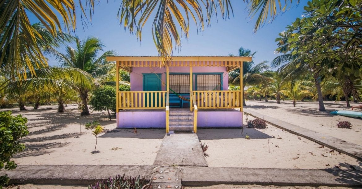 belize home return owner