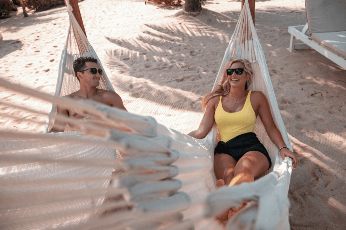 placencia-couple-beach-hammock-belize