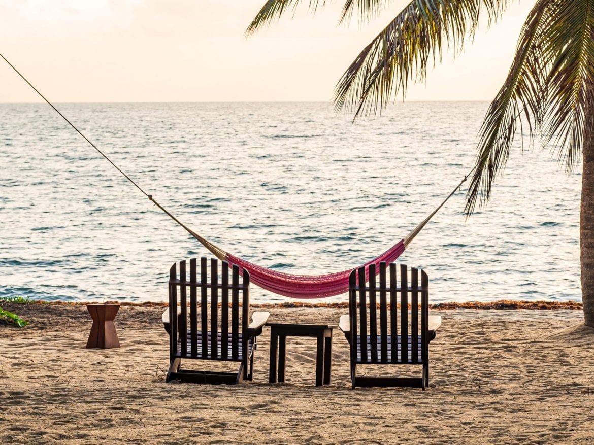 two beach chairs and hammock Hopkins beach Hamanasi