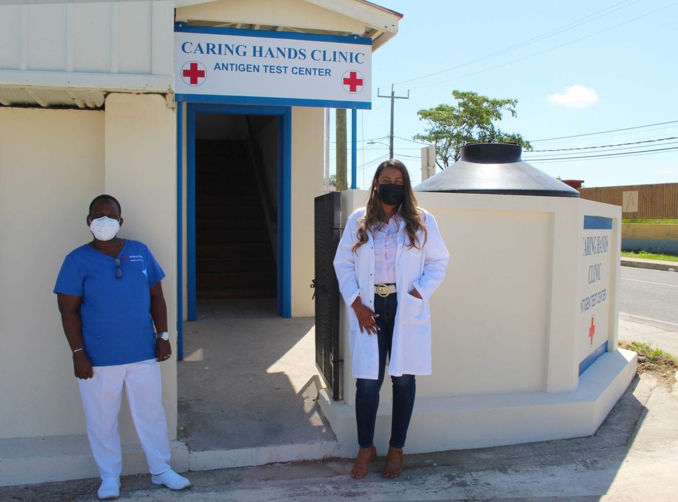 caring hands clinic Belize City tza Maya island air covid test staff