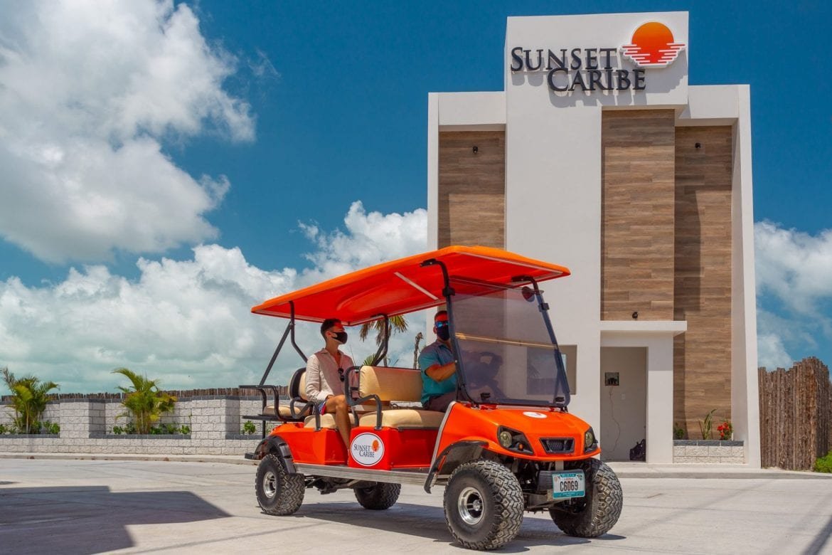 golf-carts-face-masks-belize-sunset-caribe-san-pedro-ambergris-caye