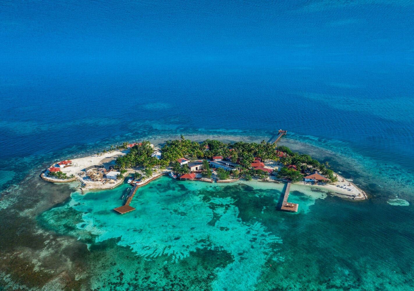 Ray Caye aerial drone Duarte Dellarole island resort belize side view