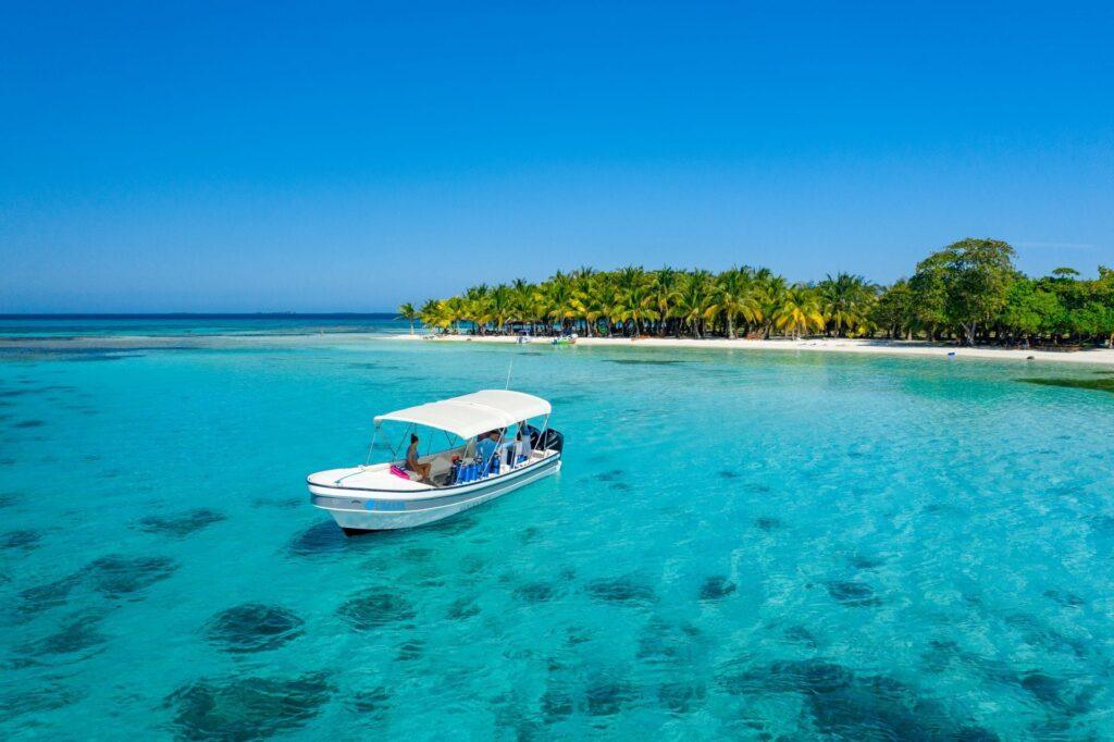 Venturing out to Moho Caye. Photo by Duarte Dellarole