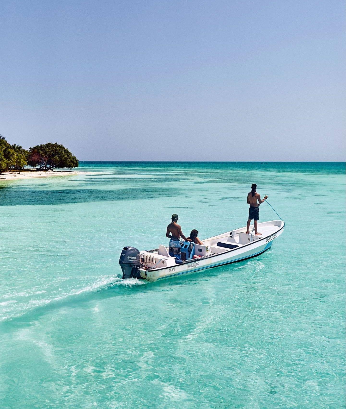 Wild-Orchid-Caye-by-Oliver-Pilcher-e1589307738830
