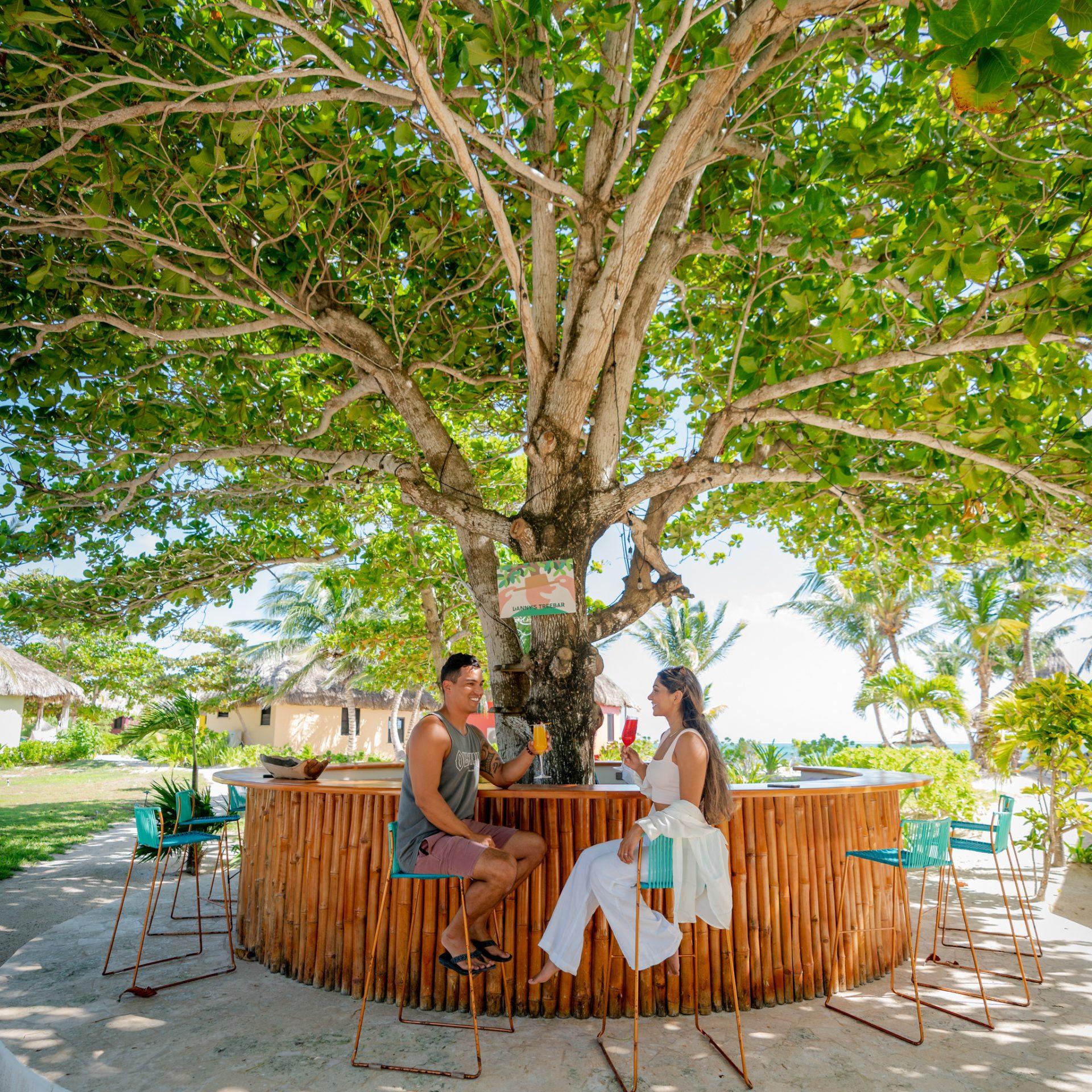 matachica-belize-ambergris-resort-couple-danny-tree-bar