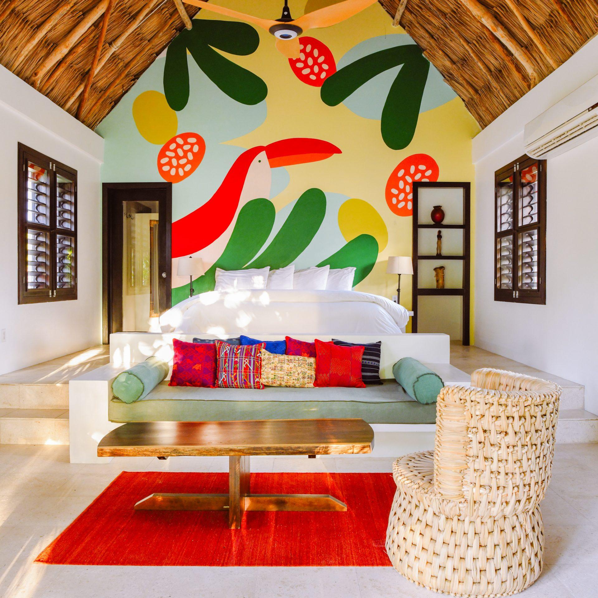 matachica-resort-room-sample-bright-mural-belize