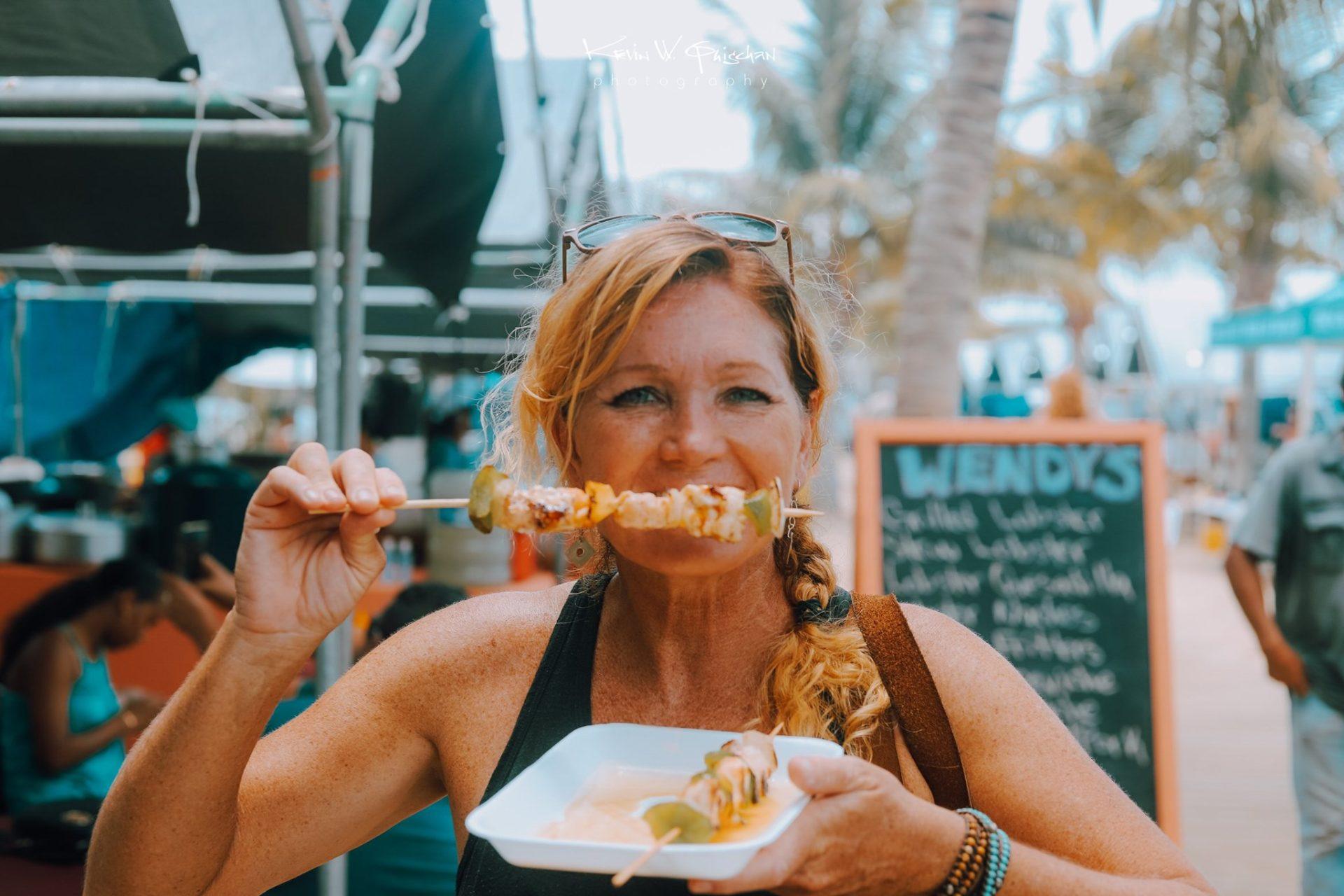 placencia-lobster-fest-2019-kevin-quischan-enjoying-meal